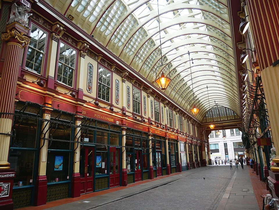 The decorated covered walkways and shopfronts of Leadenhall Market in London